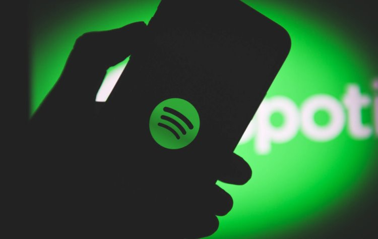 Как оплатить spotify через apple pay